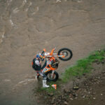 Mani Lettenbichler, Red Bull KTM Factory Racing, fixing his drowned bike after crossing the river, by ZCMC
